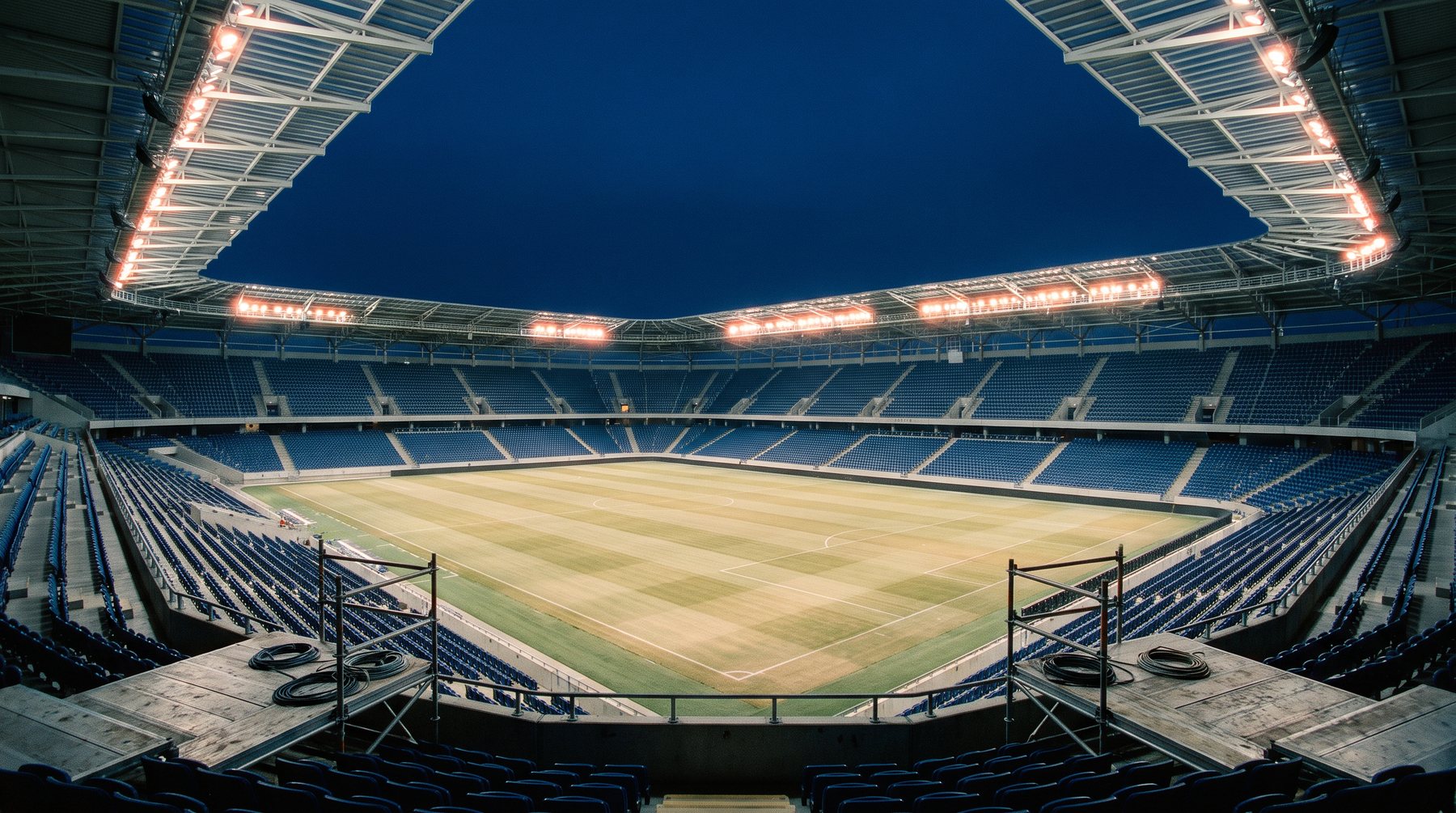 A modern stadium is the physical asset sitting behind valuations that increasingly trade like infrastructure.